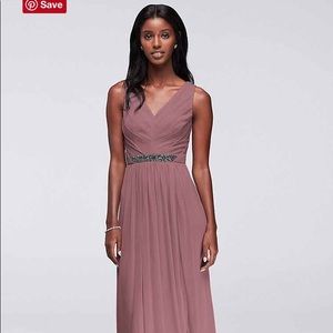 Never worn, never altered bridesmaid dress.